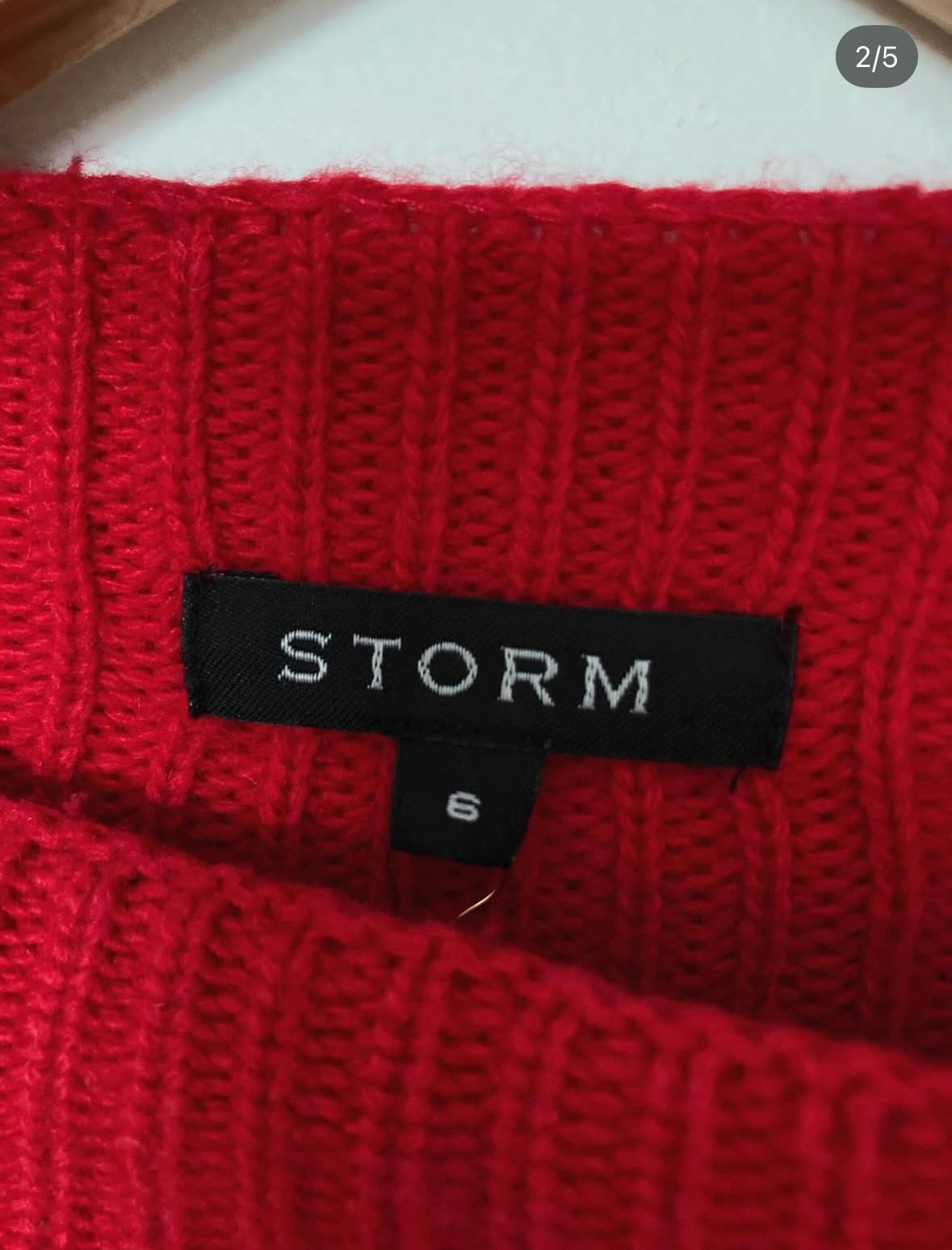 STORM Red bell sleeve knit Size 6 ( fits well up to 10)